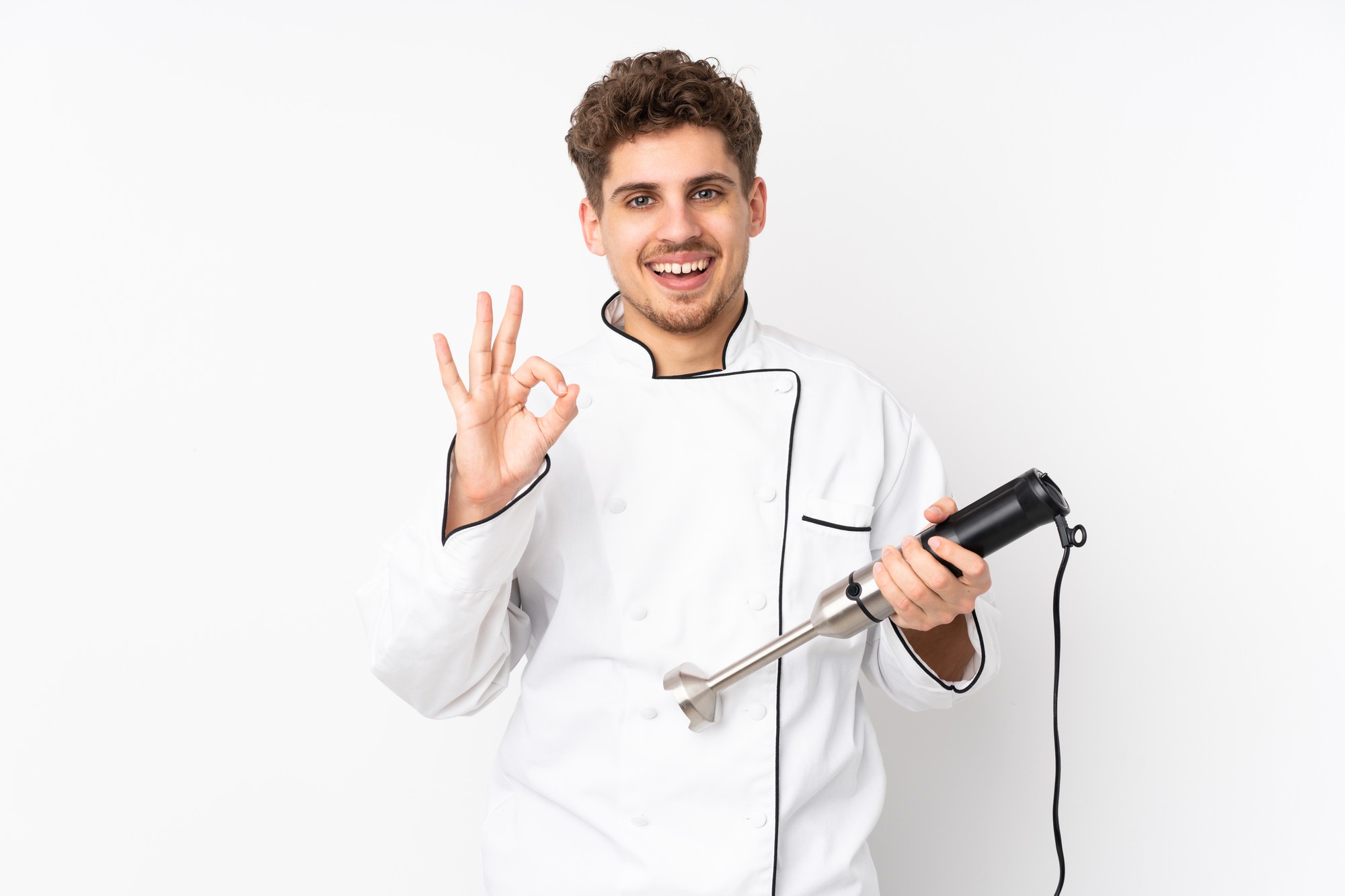 Instructor talking to camera in kitchen studio
